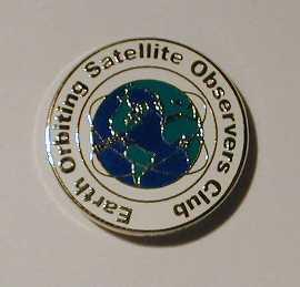 Earth orbiting satellite observing club pin